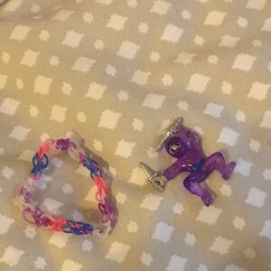 Purple Action Figure with Colorful Bracelet